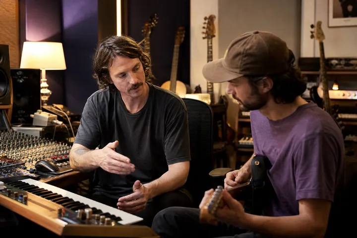 Independent musicians collaborating in a recording studio